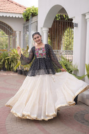 Women’s Embroidered Black Peplum Kurti with White Flared Lehenga Skirt