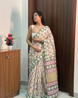 Women’s White Floral Printed Saree with Green Decorative Border