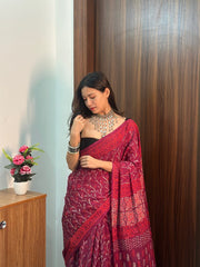Women’s Wine Red Mul Cotton Printed Saree with Traditional Patterned Border