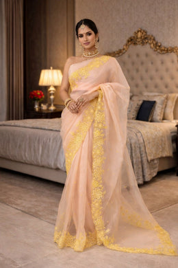 Women’s Peach Saree with Floral Embroidered Border
