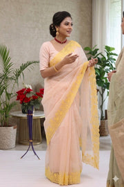 Women’s Peach Saree with Floral Embroidered Border