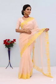 Women’s Peach Saree with Floral Embroidered Border