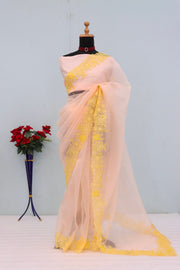 Women’s Peach Saree with Floral Embroidered Border