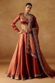 Women’s Orange Embroidered Lehenga Choli with Dupatta.