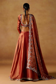 Women’s Orange Embroidered Lehenga Choli with Dupatta.