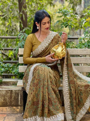 Brown Printed Saree for Women with Intricate Embroidered Border
