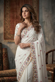 Women’s White Embroidered Saree with Floral Border and Printed Motifs