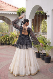 Women’s Embroidered Black Peplum Kurti with White Flared Lehenga Skirt
