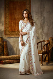 Women’s White Embroidered Saree with Floral Border and Printed Motifs