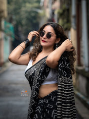 Women’s Black Printed Cotton Saree with Geometric Pattern and Contrast Border